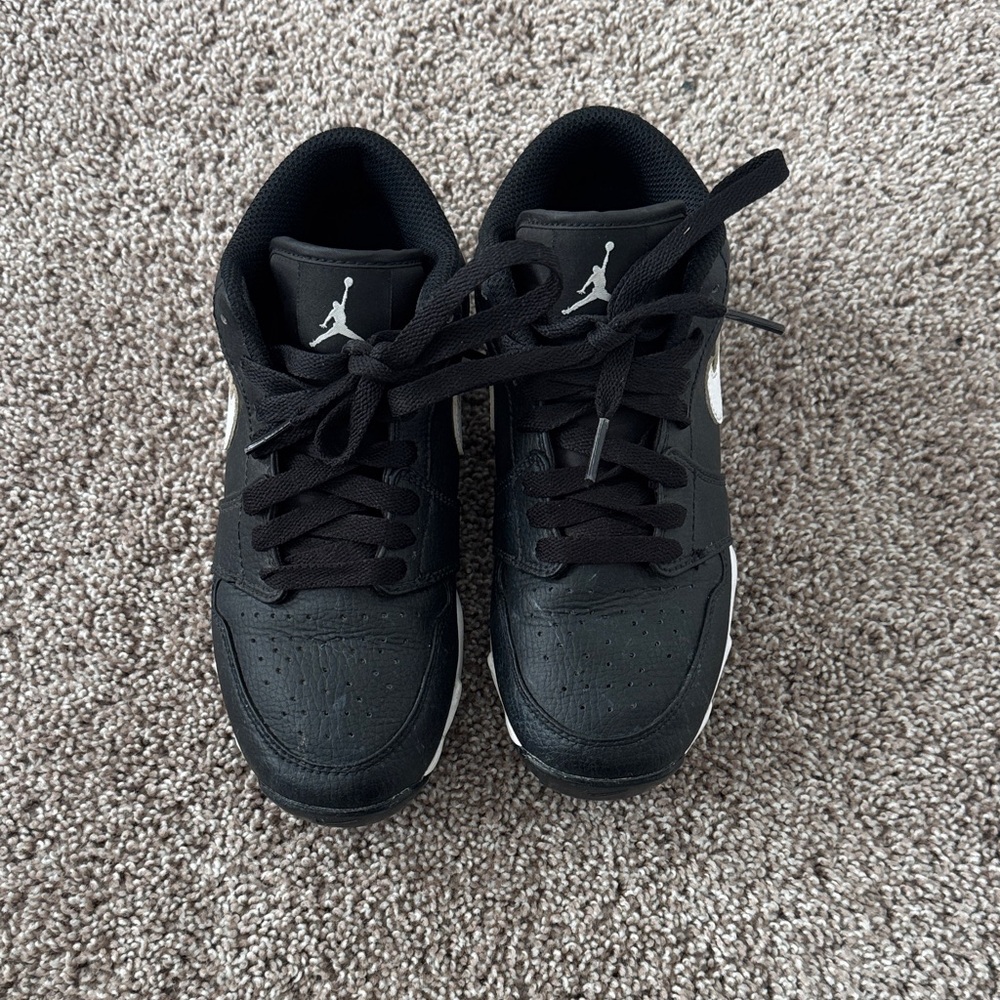 Black Jordan youth football cleats